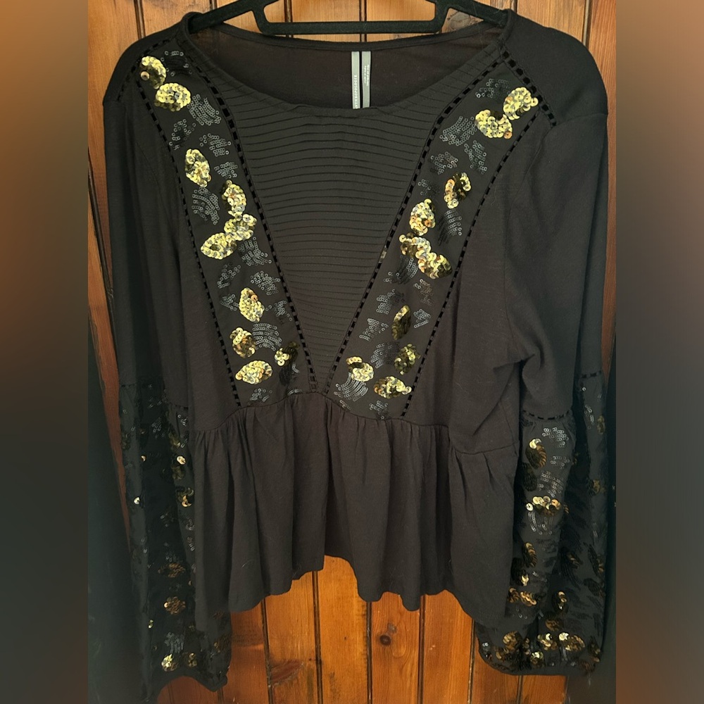Anthropologie sequined peplum top